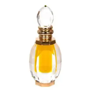 Elegant glass perfume bottle with golden-yellow liquid inside.