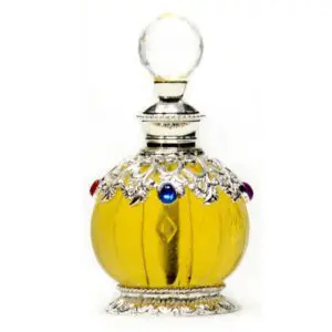 Ornate yellow perfume bottle with jeweled silver cap.