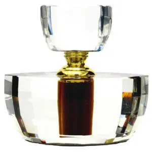 Elegant crystal decanter with gold accents, perfect for fine spirits.
