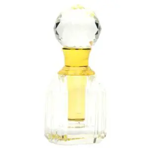 Elegant glass perfume bottle with a yellow stopper.