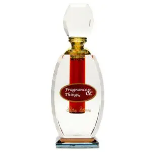 Elegant perfume bottle with gold and red accents.
