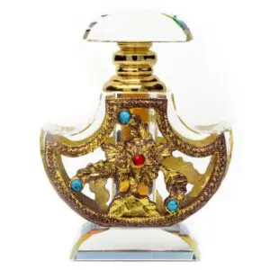 Ornate decorative perfume bottle with gold and jewel embellishments.