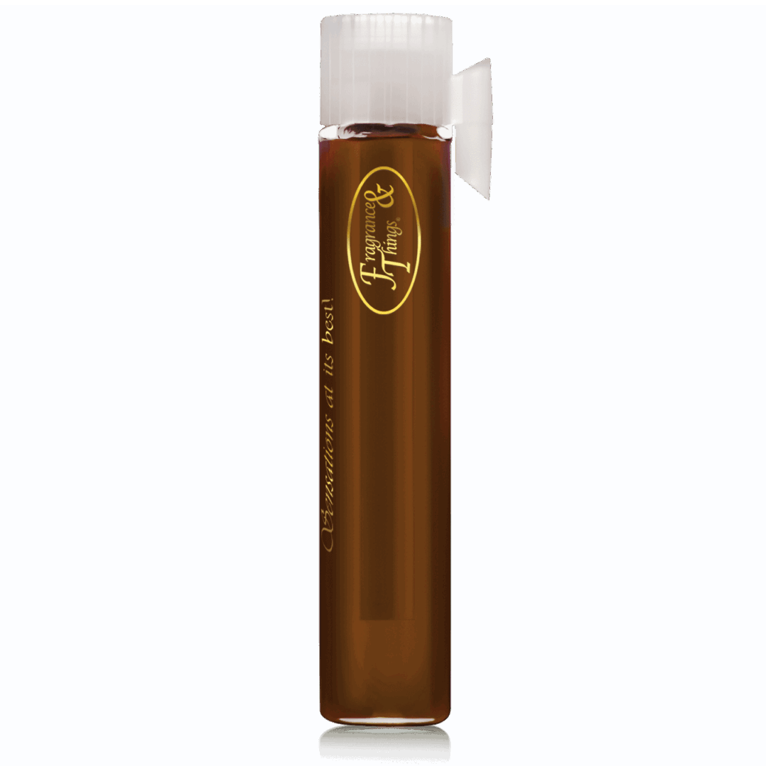 Tall glass with dark brown liquid and foam on top.