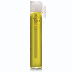 A tall glass filled with a yellowish beverage and a straw.