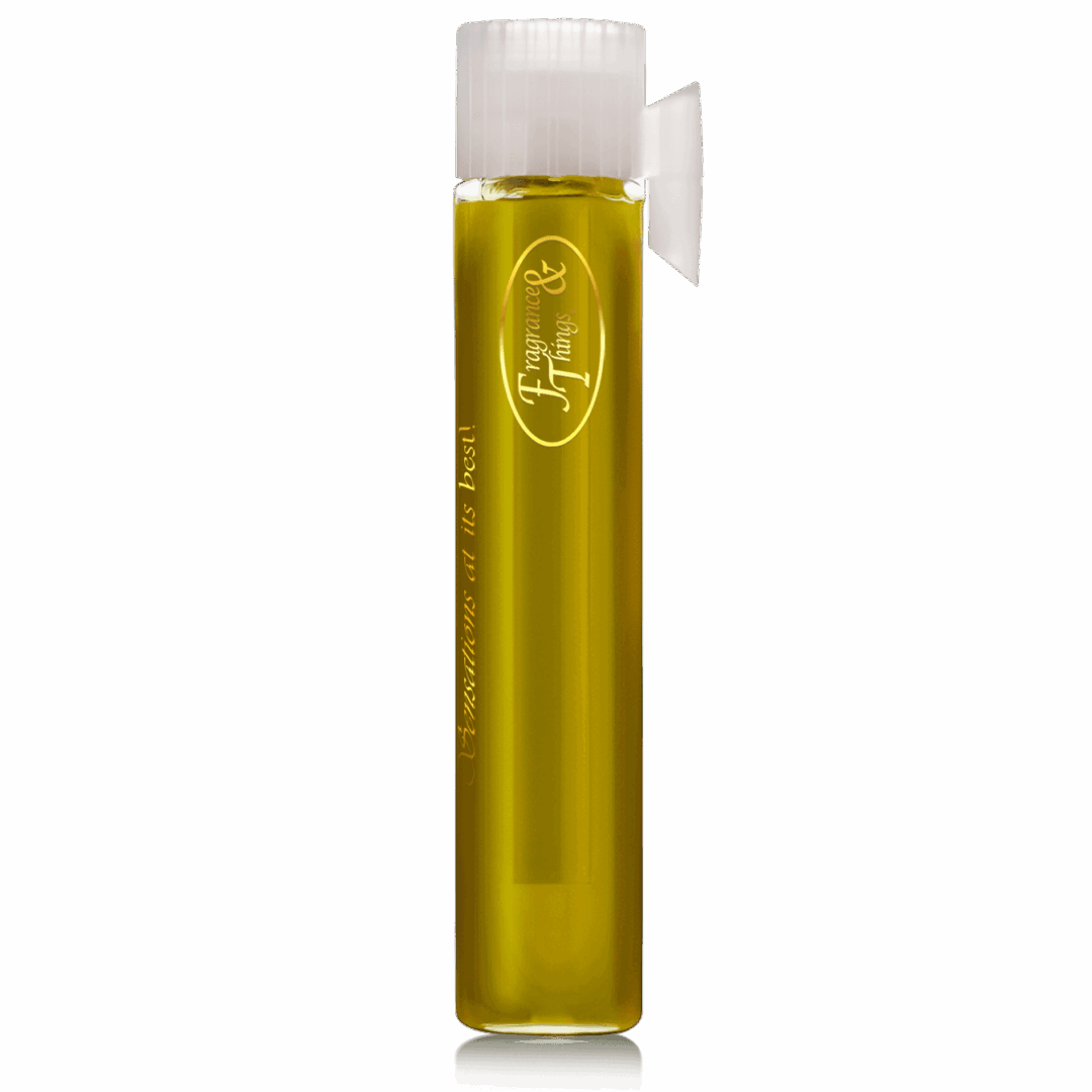 Tall glass of light beer with foam on top.