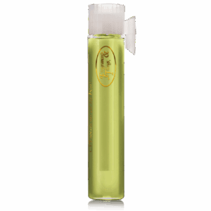 A small bottle of green liquid with a white cap and label.