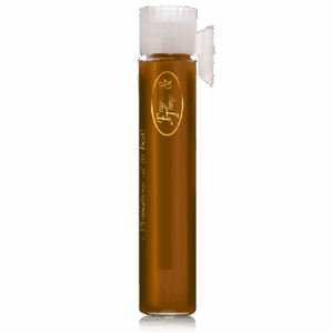 Tall glass of beer with foam on top.