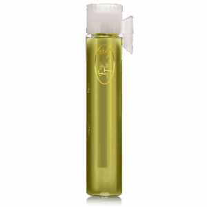 Small glass vial filled with yellow liquid and topped with a white cap.