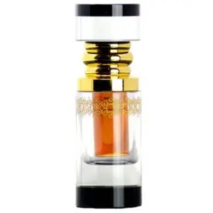 A small transparent vial with a golden cap containing amber liquid.