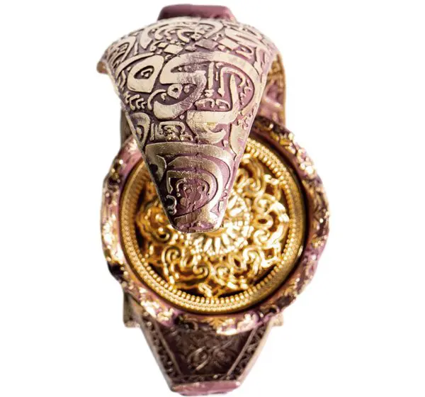 Intricately designed ancient ceramic vessel with detailed carvings and patterns.