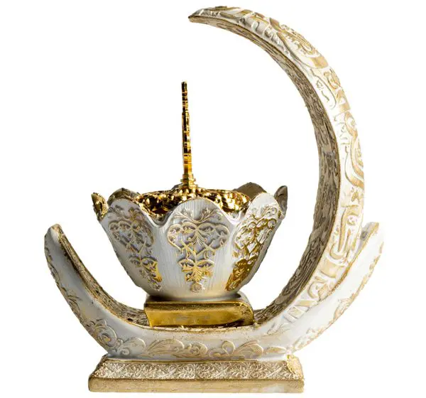 Ornate crescent and star decorative piece in white and gold.