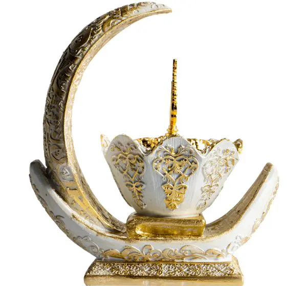 Ornate golden and white decorative crescent with a floral bowl centerpiece.