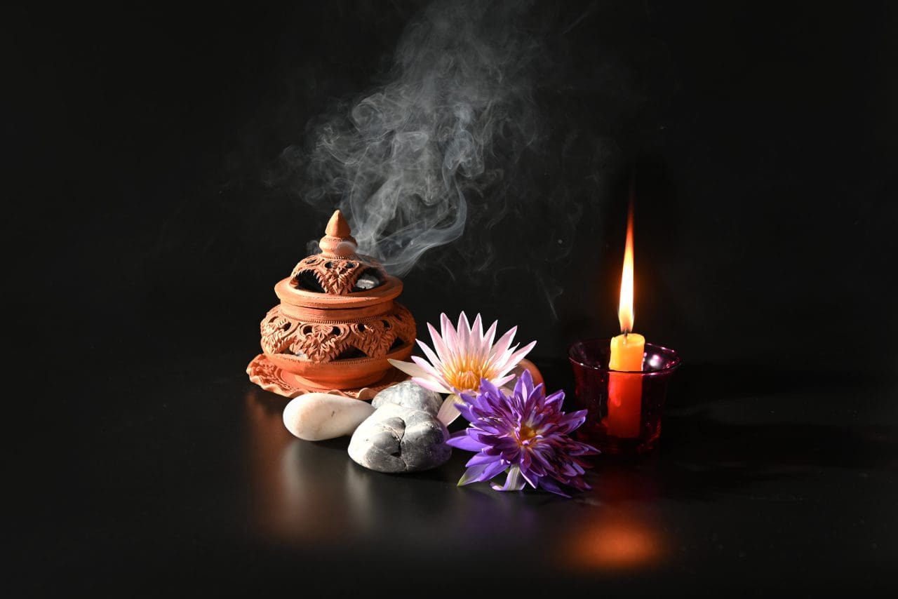 Elegant fragrance ritual setting with warm ambient light